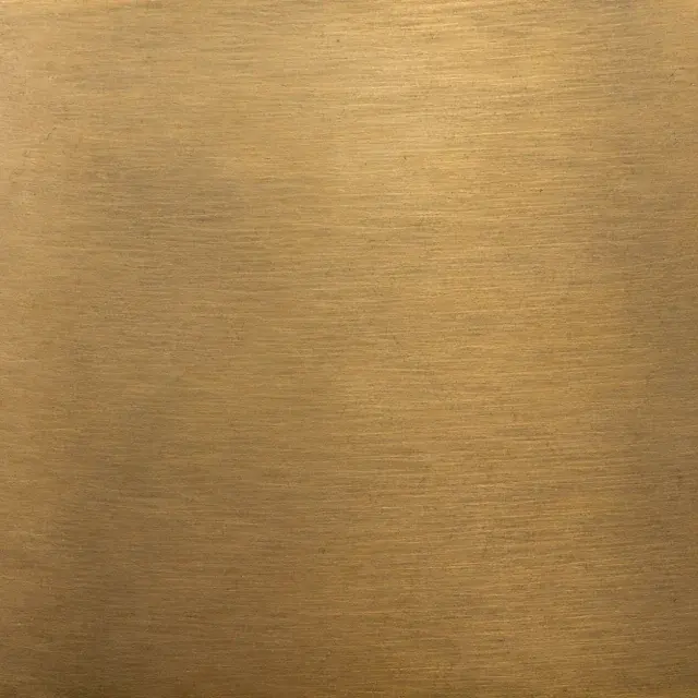 Close detail of softly patinated brushed brass