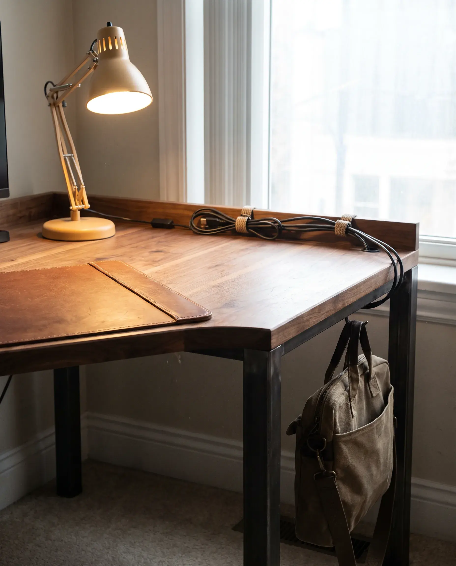 Custom solid-timber executive desk with leather inset, made by Halo